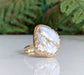 Handcrafted Mother of Pearl Kintsugi ring on a gold-filled band, perfect for unique gifts and special occasions.