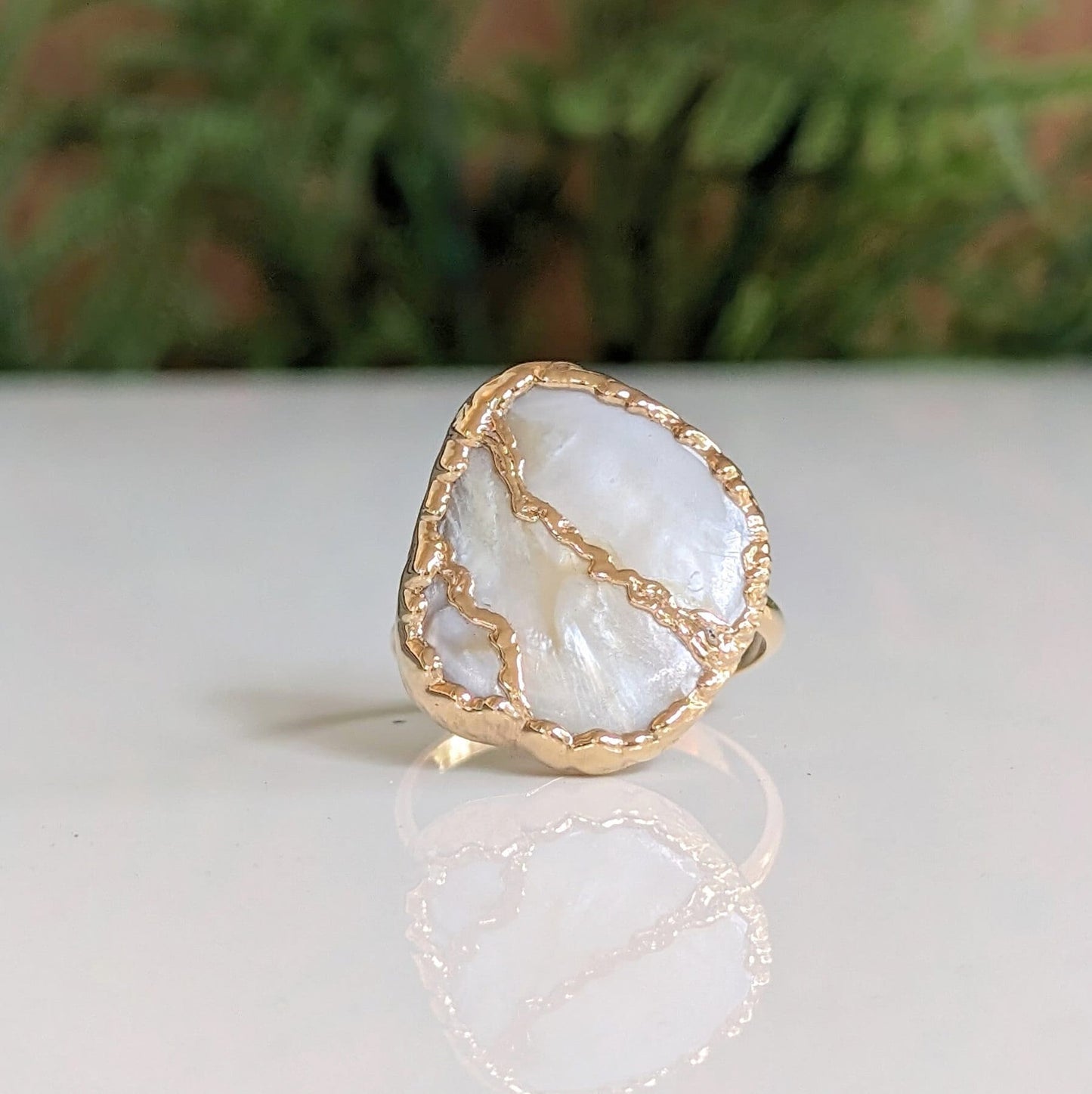 Handcrafted Mother of Pearl Kintsugi ring on a 14k Gold-filled band, perfect for gifts and special occasions.