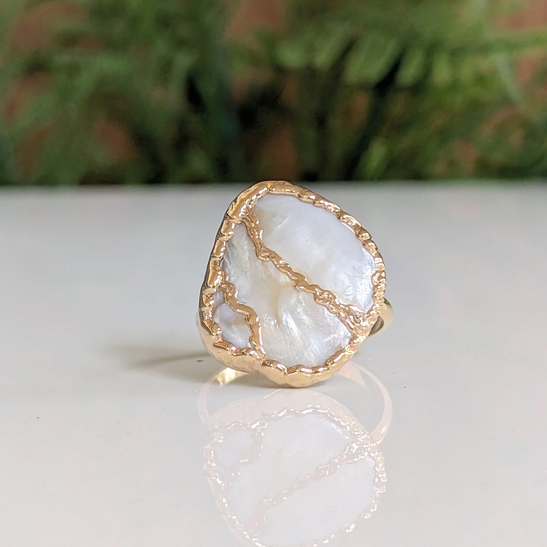 Handcrafted Mother of Pearl Kintsugi ring on a 14k Gold-filled band, perfect for gifts and special occasions.