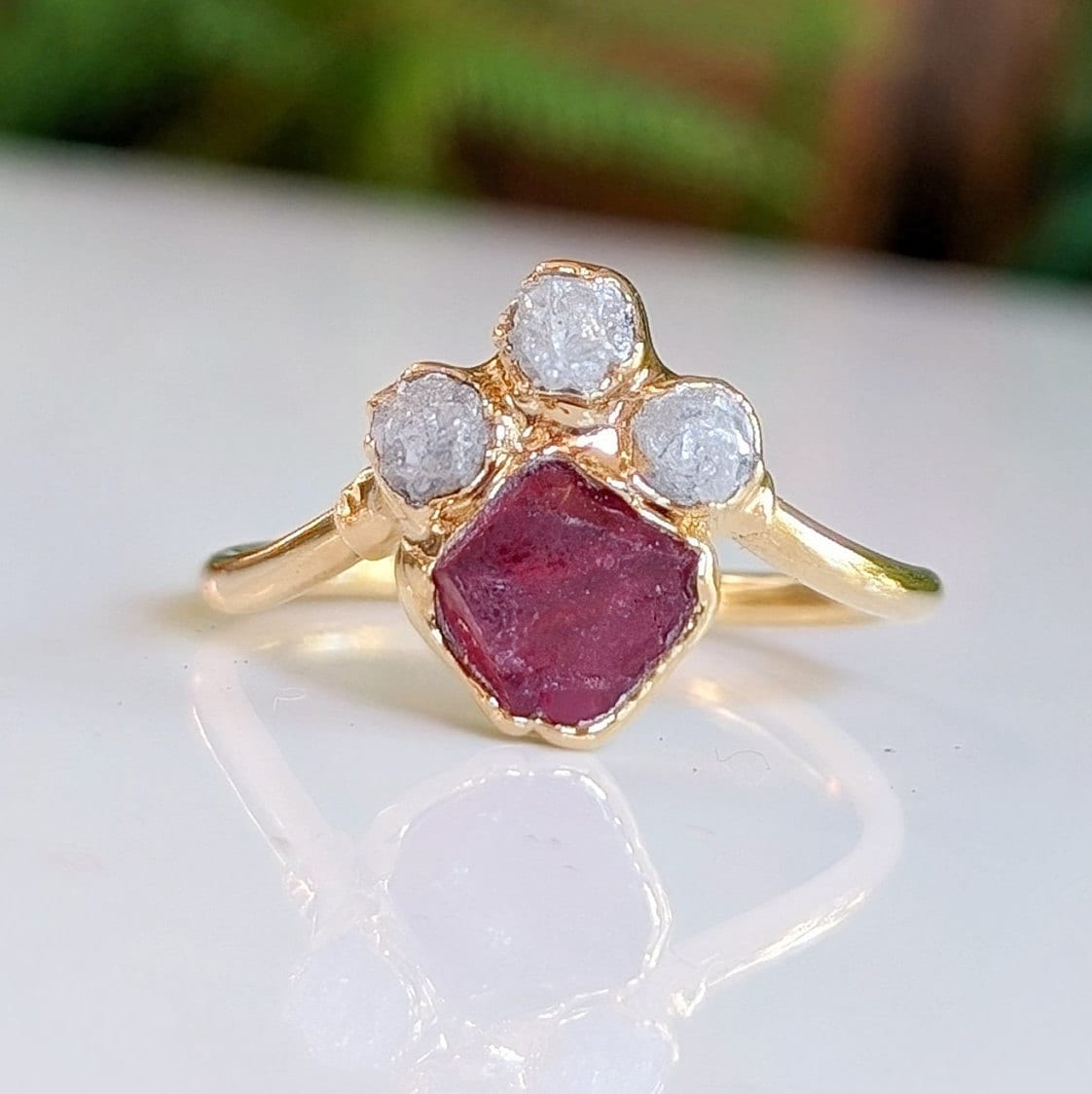 Raw Diamond and Pink Spinel Chevron Engagement Ring in gold, showcasing unique handcrafted design.