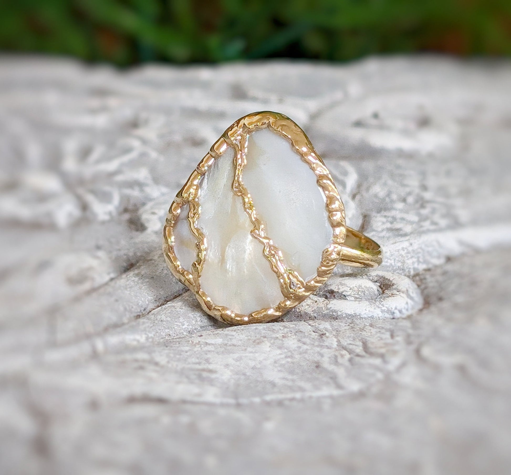 Handcrafted Mother of Pearl Kintsugi ring with 14k gold-filled band, unique cocktail ring perfect for special occasions.