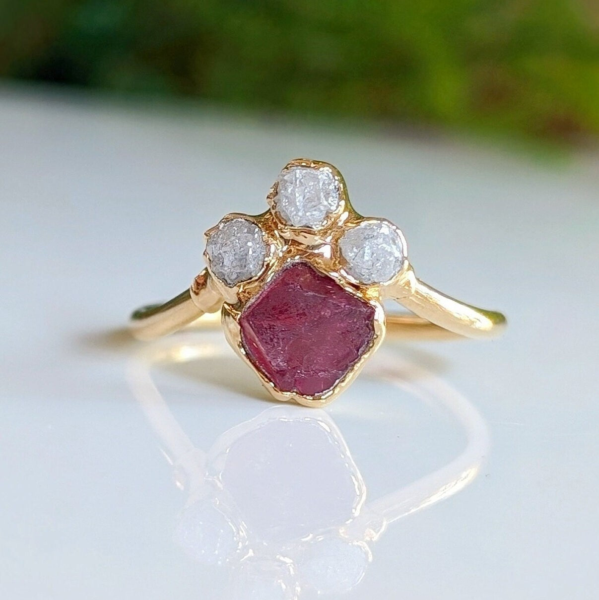 Raw Diamond and Pink Spinel Chevron Engagement Ring on a gold band, featuring unique handcrafted design and ethically sourced gems.