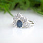 Raw Montana Sapphire and diamond bridal ring set in sterling silver, showcasing a unique teal blue stone and conflict-free diamonds.