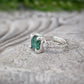 Raw emerald and diamond engagement ring in solid 14k gold, showcasing a unique mint green raw emerald.