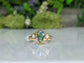 Kite-shaped Moss Agate ring with Herkimer diamonds, symbolizing love and elegance for Valentine's Day.
