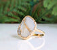 Handcrafted Mother of Pearl Kintsugi ring on a gold-filled band, perfect as a unique gift for any occasion.