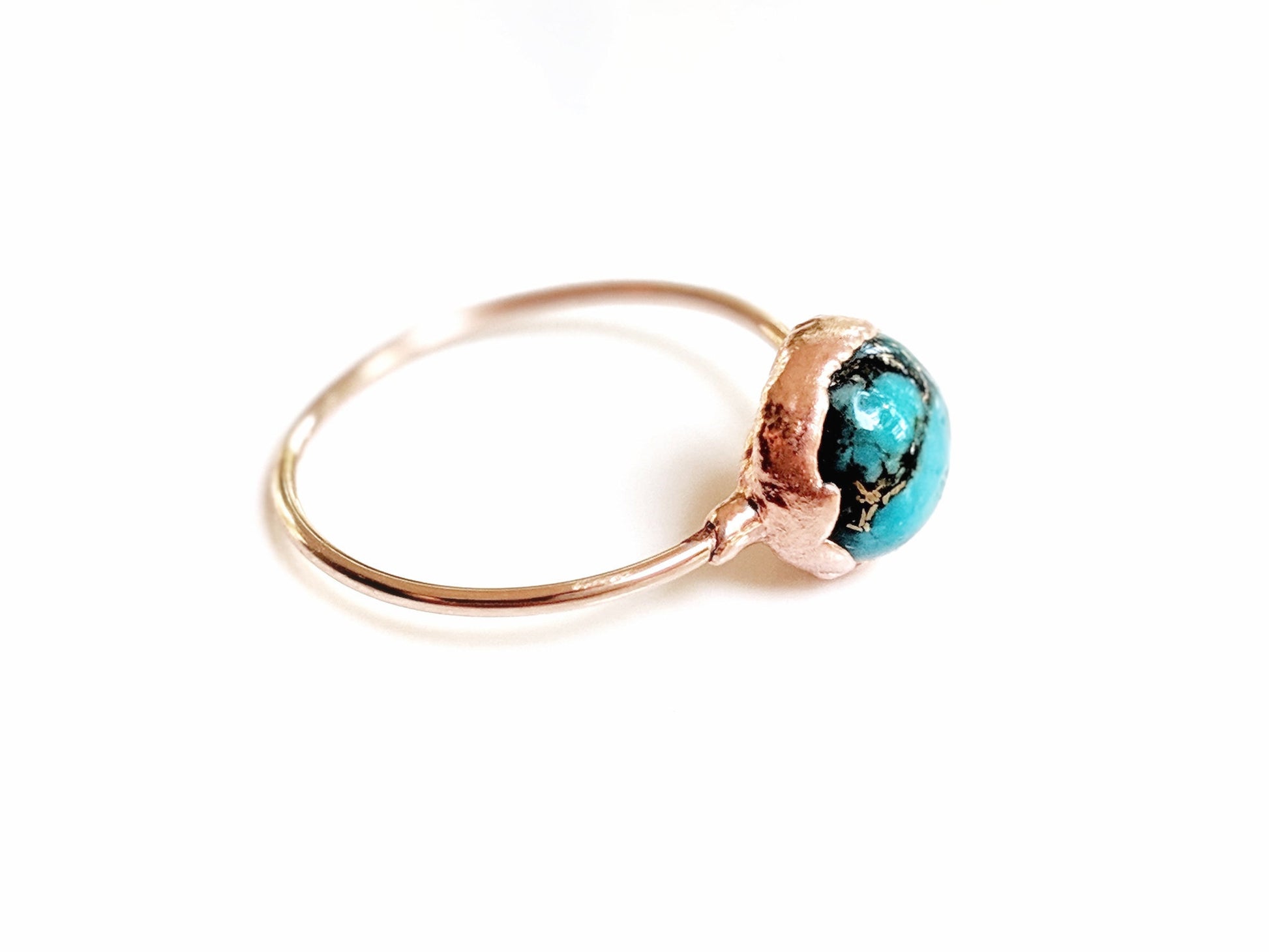 Natural turquoise ring featuring a 10mm stone on a 14k gold filled band, unique and handcrafted.