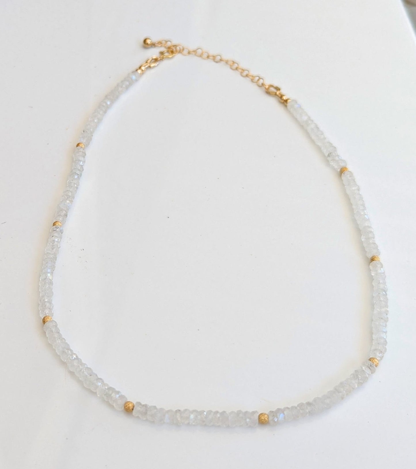 Rainbow Moonstone faceted beaded necklace with gold accents, ideal gift for Mother's Day or bridal occasions.
