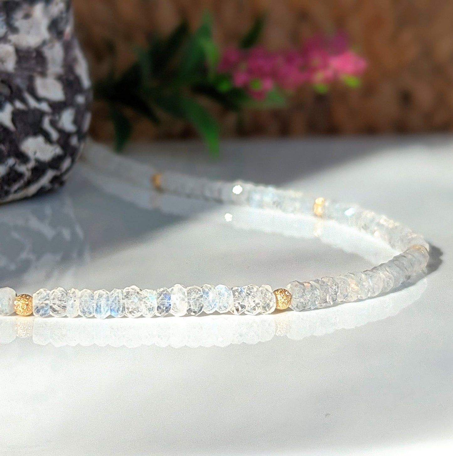 Rainbow Moonstone faceted beaded necklace accented with gold, perfect gift for Mother's Day or bridal occasions.