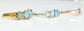 Raw Aquamarine eternity rings in gold and silver settings, showcasing natural gemstones with a rustic elegance.