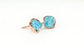Dainty raw Aquamarine stud earrings in 18k gold plating, showcasing unique rough stones perfect for March birthdays.