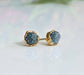 Handcrafted raw blue diamond stud earrings in gold setting, perfect for bridal or casual wear.