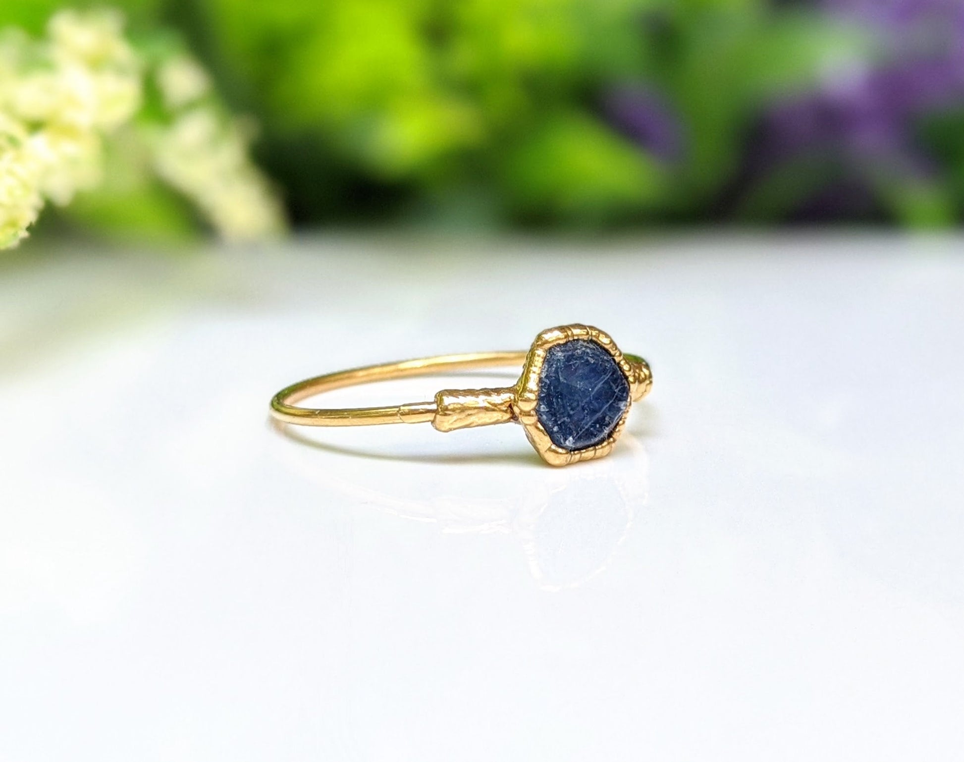 Handcrafted raw blue Sapphire ring set on a 14k Gold band, perfect for September birthdays.