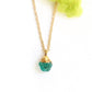 Handcrafted raw crystal necklace featuring turquoise gemstone set on gold filled chain.