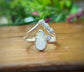 Raw diamond Chevron engagement ring in 18k Gold with unique handcrafted design and conflict-free diamonds.