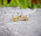 Gold Chevron wedding band featuring seven raw conflict-free diamonds, unique engagement or wedding ring.