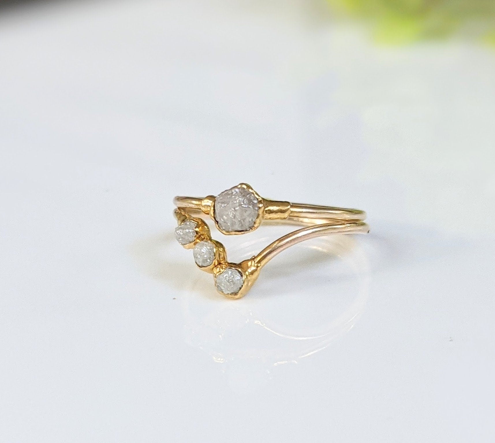 Raw diamond chevron wedding ring set in 18k gold, showcasing unique handmade design with ethically sourced diamonds.