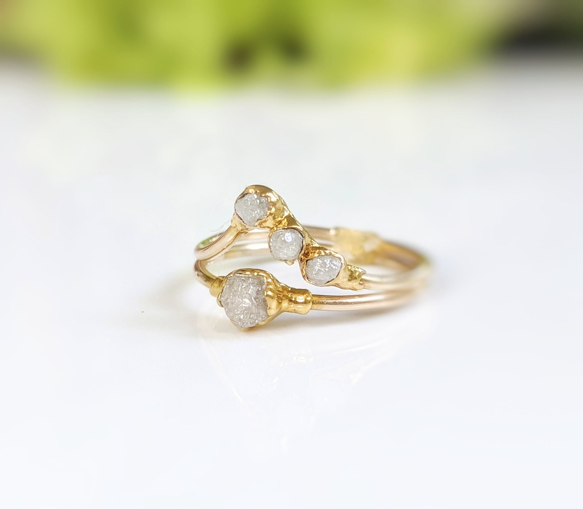 Raw diamond chevron wedding ring set in 18k gold, featuring unique uncut diamonds for a one-of-a-kind love.
