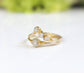 Raw diamond chevron wedding ring set in 18k gold, featuring unique uncut diamonds for a one-of-a-kind love.