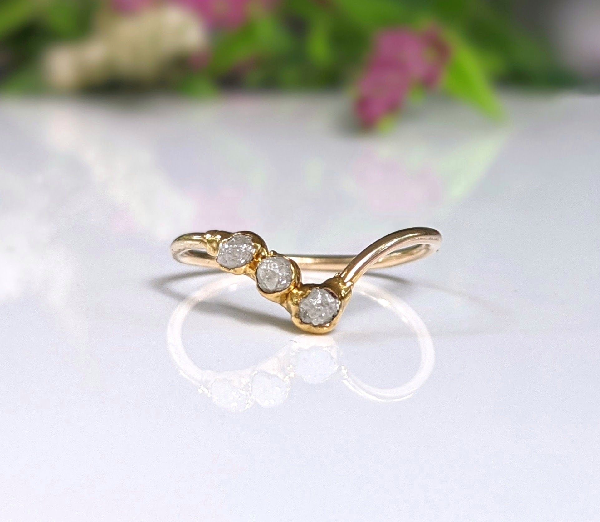 Handmade raw diamond chevron wedding ring set featuring uncut diamonds and 18k gold bands.