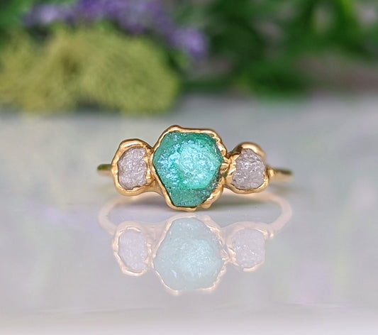Handcrafted Raw Emerald and diamond engagement ring with rustic elegance, featuring natural gemstones.