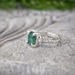 Raw emerald and diamond engagement ring in solid 14k gold, showcasing a unique mint green raw emerald.