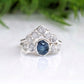 Raw Montana Sapphire and diamond bridal ring set in sterling silver, showcasing unique teal blue sapphire and conflict-free diamonds.