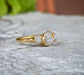 Raw multi diamond engagement ring featuring uncut diamonds on a solid gold band, perfect for unique proposals.