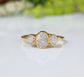 Raw multi diamond engagement ring with handcrafted gold band and three unique rough diamonds.