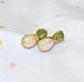 Handcrafted raw Peridot and Opal stud earrings, featuring a rustic yet elegant design, perfect for any occasion.