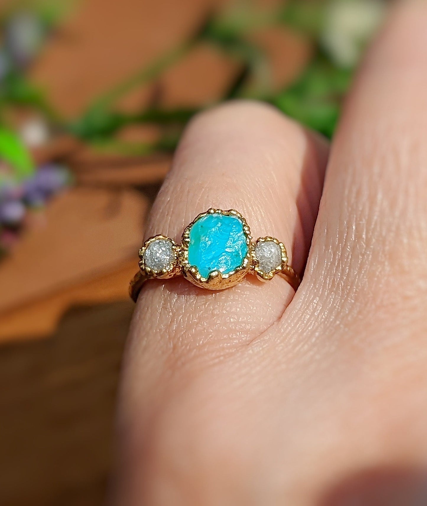 Raw Peruvian Opal and diamond ring in solid 14k gold, featuring a unique blue opal centerpiece.