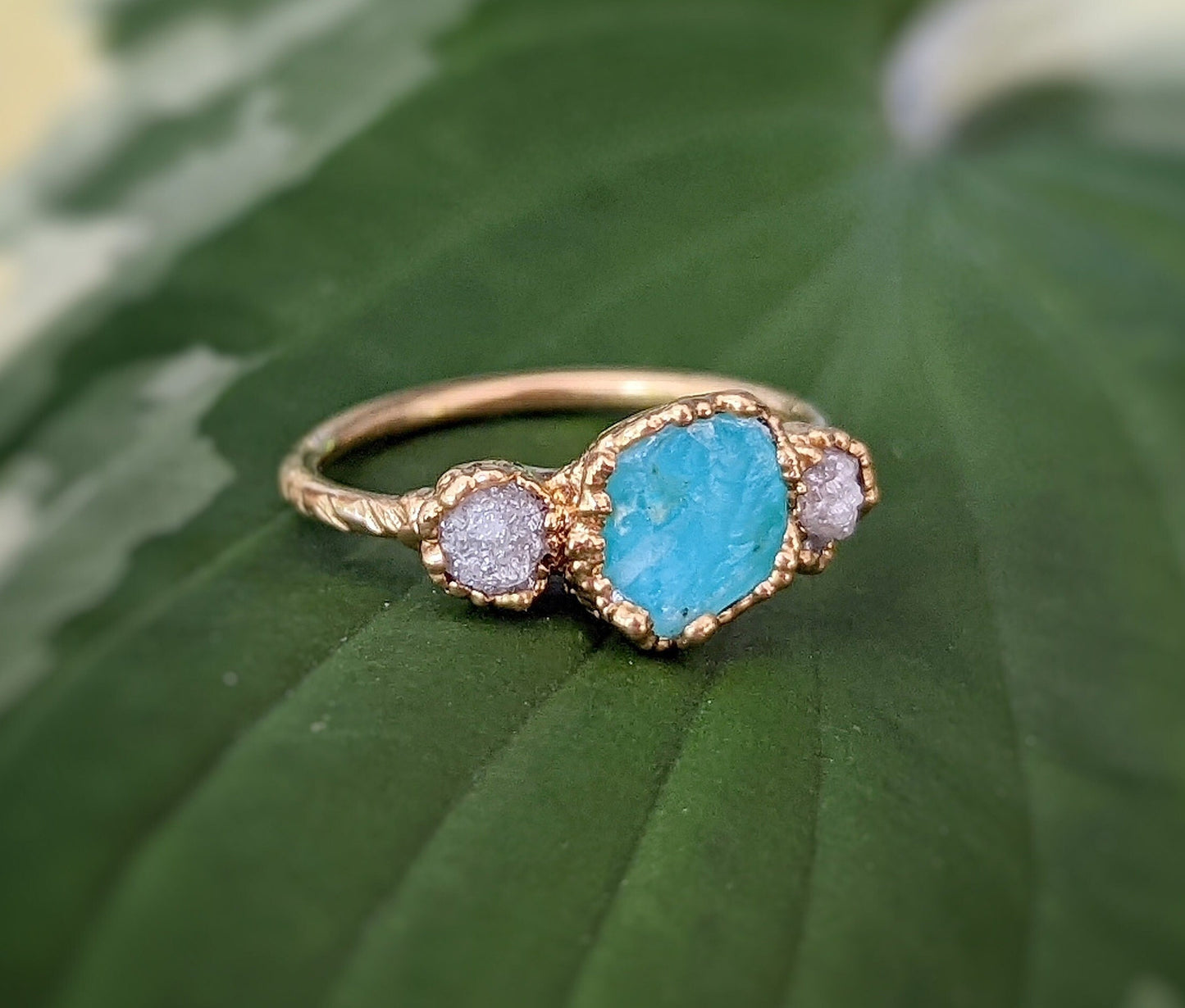 Raw Peruvian Opal and diamond ring in solid 14k gold, showcasing a unique handcrafted design.