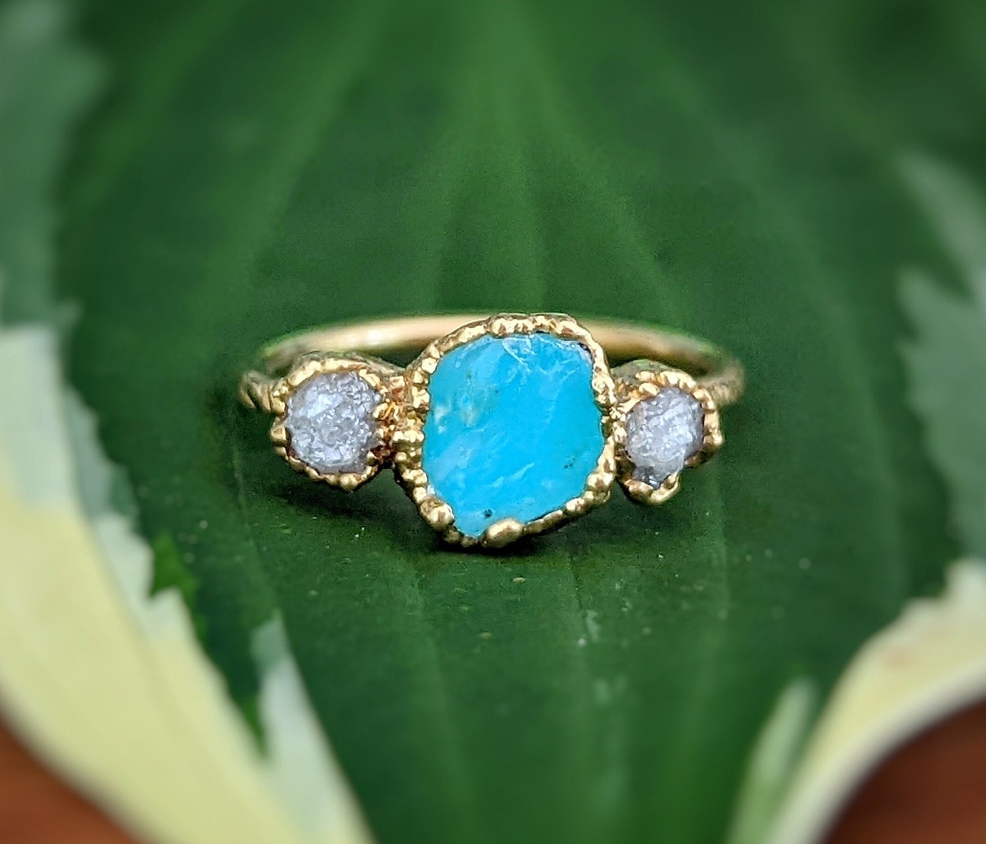 Raw Peruvian Opal and diamond ring in solid 14k gold, featuring a vibrant blue opal with two conflict-free diamonds.