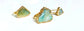 Handcrafted raw Peruvian opal rings with aqua blue stones set in gold-filled bands.