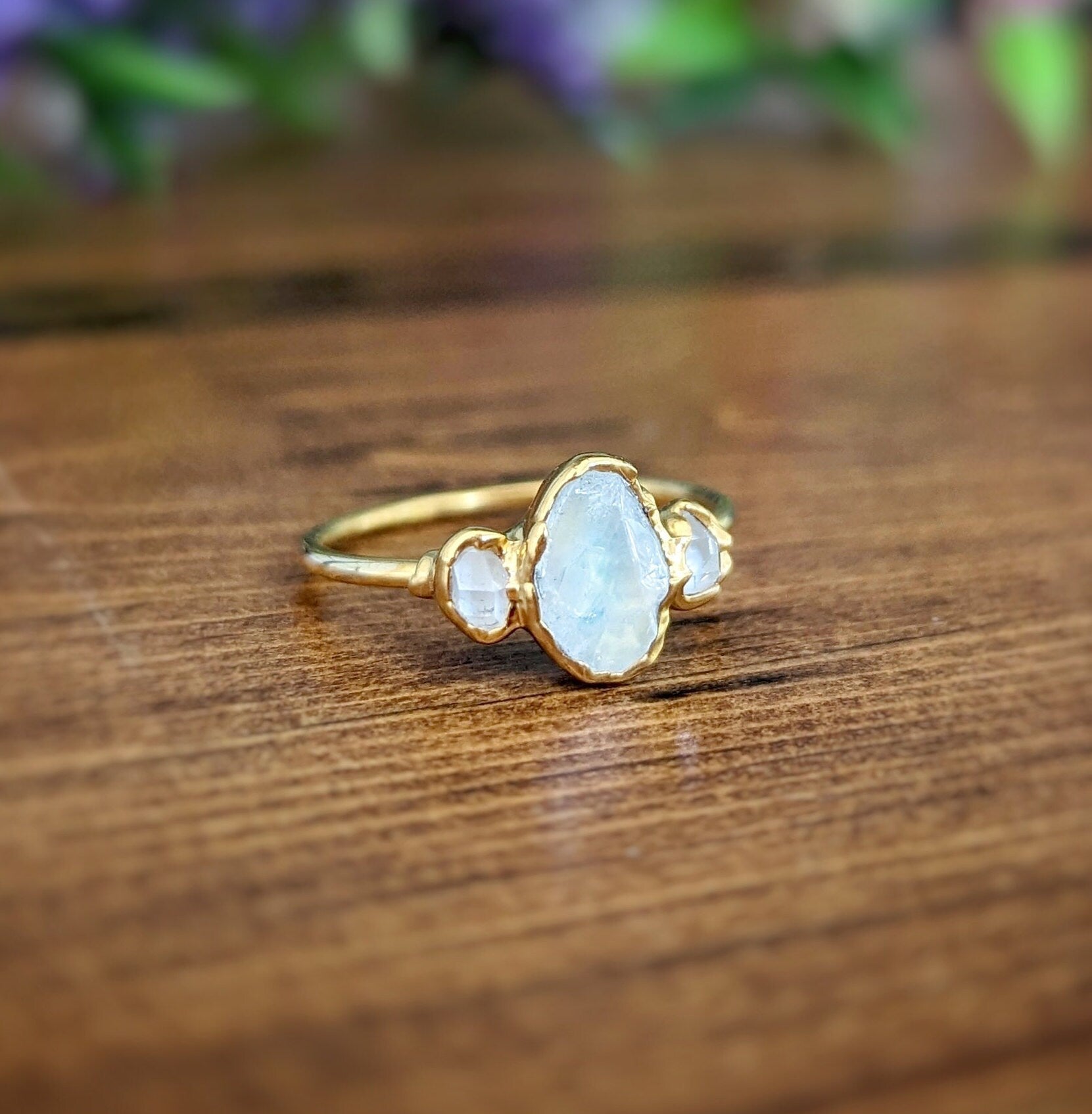 Raw rainbow Moonstone and Herkimer diamond engagement ring set in 14k gold with 18k gold plating.
