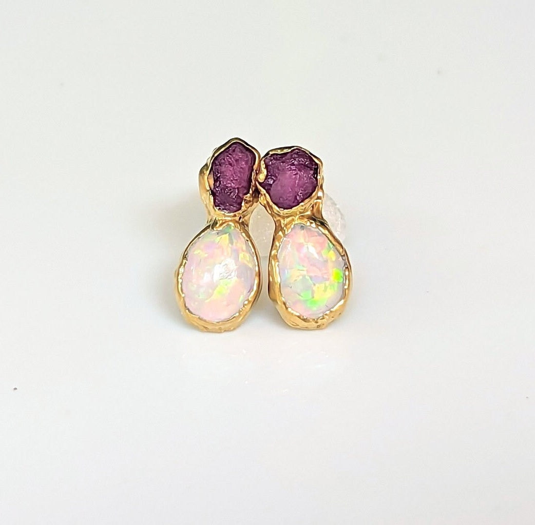 Handcrafted raw Ruby and Opal stud earrings with unique gold framing, ideal for bridal or everyday elegance.