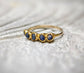 Raw sapphire multi-stone ring on a solid 14k gold filled band, featuring unique handcrafted design.