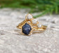 Raw sapphire wedding ring set with diamond chevron rings, handcrafted in solid 14k gold for a unique and rustic look.
