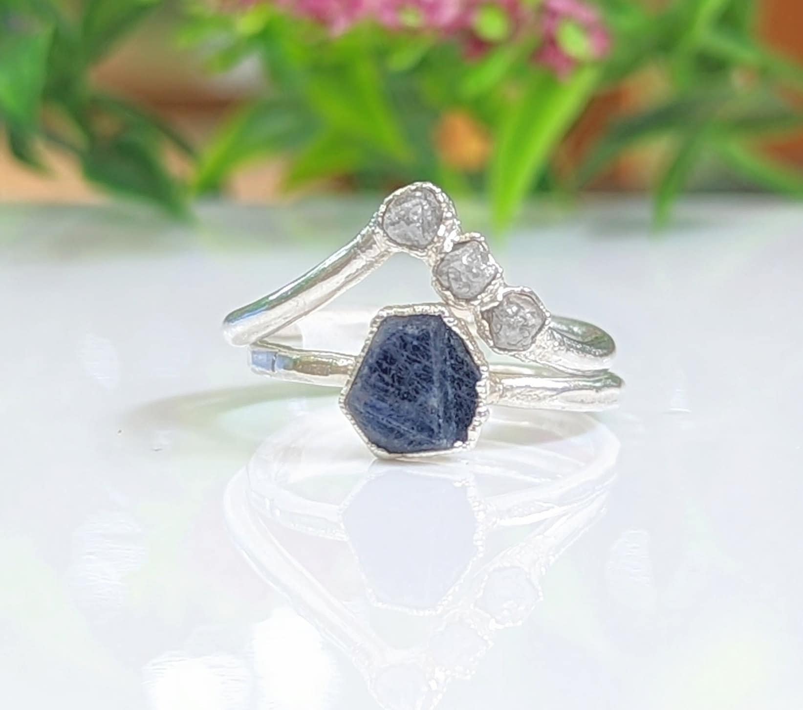 Raw sapphire wedding ring set with a chevron diamond band, handcrafted in solid 14k gold, perfect for nature lovers.