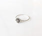 Unique raw uncut grey diamond engagement ring set on a sterling silver band, perfect for alternative proposals.