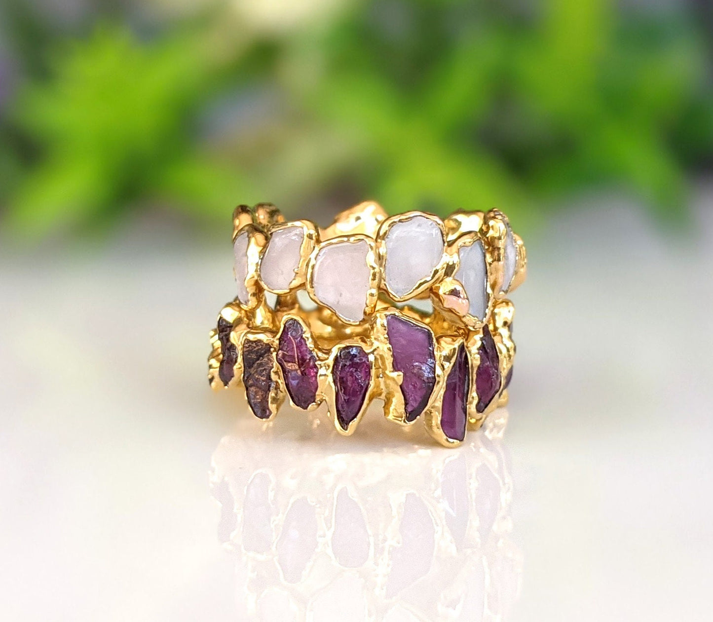 Rose Quartz Eternity Gold ring featuring unique gemstone shapes on a gold filled band, showcasing elegance and charm.