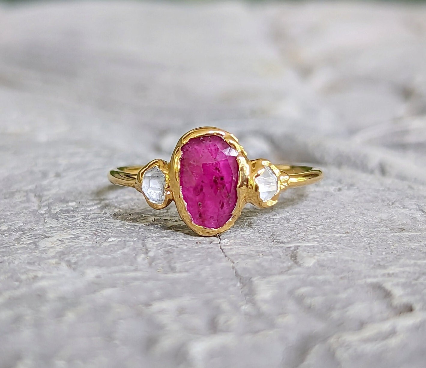 Rubellite Tourmaline and diamond engagement ring on 14k gold band, showcasing pink gemstone and Herkimer diamonds.