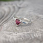 Rubellite Tourmaline engagement ring in solid 14k gold with organic textured band and trilliant pink gemstone.