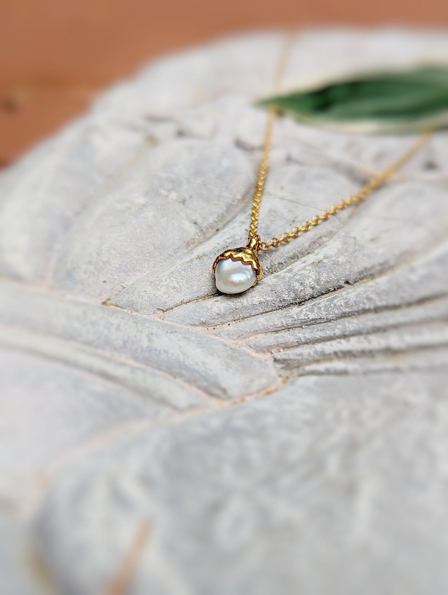 Dainty Freshwater Keshi Pearl necklace on 14k gold filled chain, handcrafted and plated in 18k gold.