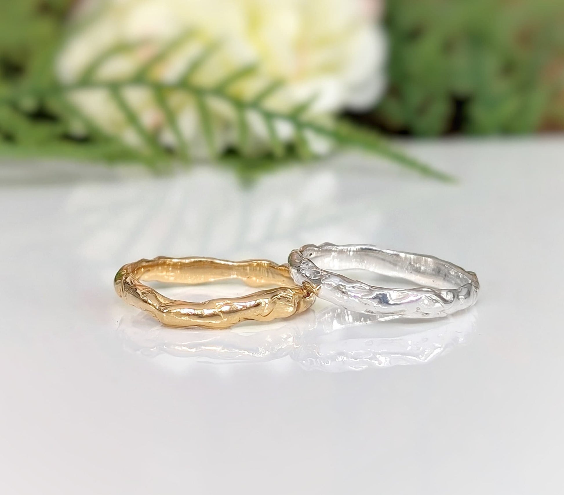 Molten Gold and Silver simple wedding bands showcasing organic textures and elegant designs