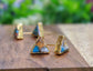 Spiny oyster copper turquoise triangular stud earrings on gold posts, showcasing vibrant colors and natural beauty.