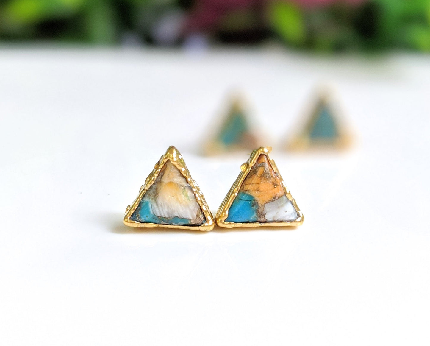 Spiny oyster copper turquoise triangular stud earrings on gold posts, elegant boho style jewelry.