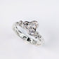Silver CZ Cluster ring featuring three sparkling cubic zirconia stones in an organic molten band design.