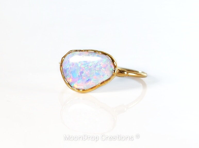 Handcrafted Australian Opal ring on a 14k Gold filled band, perfect for engagements or special occasions.